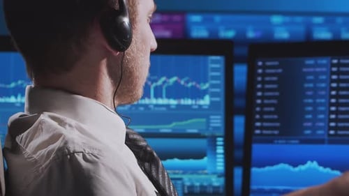 Trader Works in Office Using Workstation and Analysis Technology Workplace of Professional Crypto