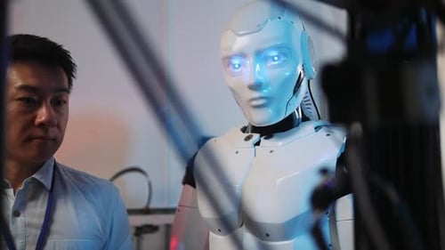Human-Like Robot Standing Still in Futuristic Workplace