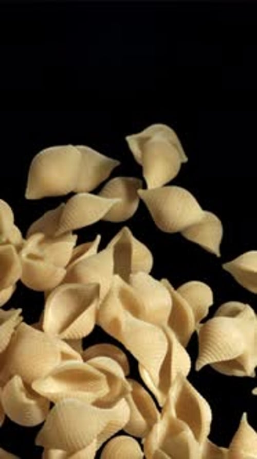 The Dry Pasta Flies Up and Falls Down Filmed on a Highspeed Camera at 1000 Fps