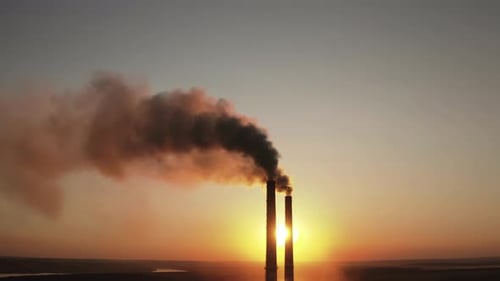 Power pylons on sunset time background. High voltage electric tower at the sunset. Fabric concept.