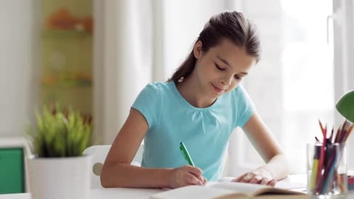 Diligent Girl Doing Homework at Desk Indoors
