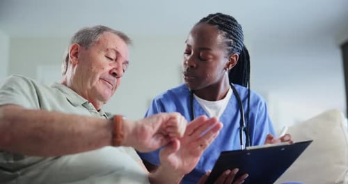 Senior Man and Medical Professional Discussing Health