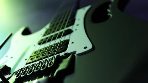 Modern Electric Guitar Body Filmed with a Shallow Depth of Field in a Studio Setting This Musical