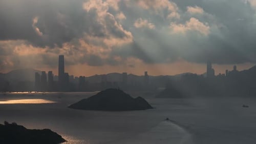 Sunset, magic hour at Victoria Harbor, Hong Kong, viewing from Tsim Sha Tsui to Hong Kong island. Ci
