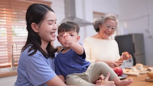 Happy Family Cooking Together in Cozy Home Kitchen