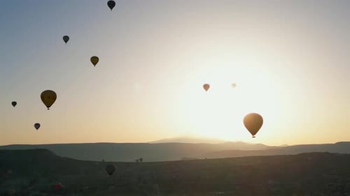 Breathtaking Hot Air Balloons Flying Over Cappadocia at Sunrise