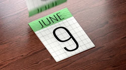 Animated Desk Calendar Flipping Through June Dates