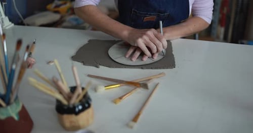 Hands View of Woman Making Ceramics Objects Inside Creative Pottery Studio -