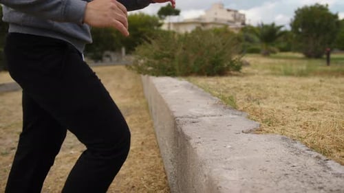 Adult Doing Step Exercises Outdoors