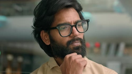 Thoughtful Arabian Businessman Thinking of Business Challenge Rise Finger Come Up with Idea