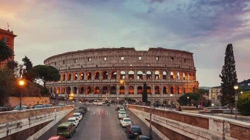 Rome Italy Colosseum Traffic Near Flavian Amphitheatre During Sunset Evening And Night Time Famous