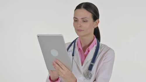 Young Adult Doctor Using Tablet in Studio
