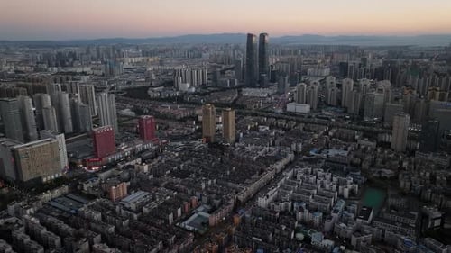 Aerial view of buildings and towers, China.