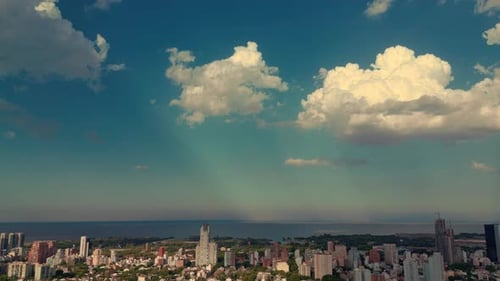 Timelapse over the city, clouds and daylight with drone
