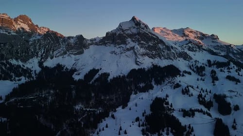 Switzerland Fronalpstock mountain summit winter nature alpine landscape, aerial drone