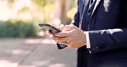 Adult Using Smartphone in City