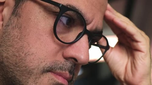 Close Up of Man Wearing Glasses Indoors