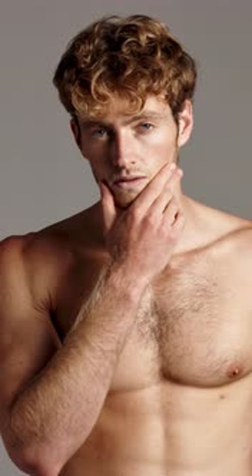 Beard, face and grooming with shirtless man in studio for masculine beauty, hygiene or skincare