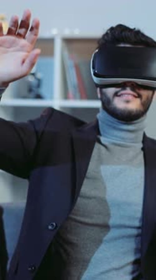 Man Experiences Virtual Reality with VR Headset