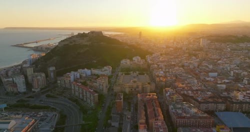 Establishing Shot Alicante Sunset Over the City Center of Alicante City Spain Aerial View of a