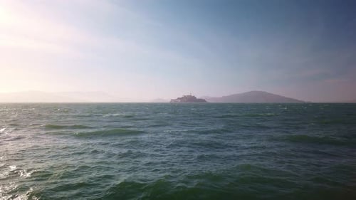 Gimbal wide static shot of Alcatraz Island from the shores of San Francisco, California. 4k at 60 FP