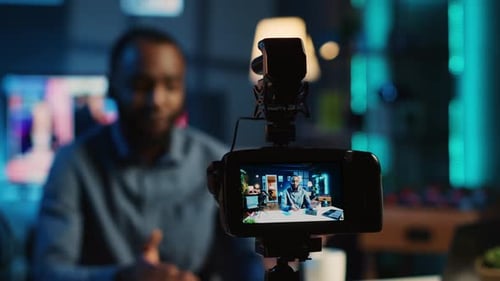 Man Recording Video in Home Studio