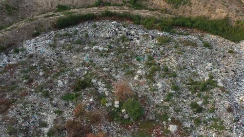 Top View of a Large Landfill Pile in a Countryside