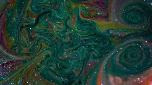 Abstract Colors and Glittering Liquid Mixing