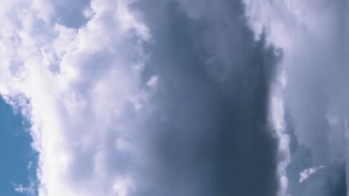 Cloudy Sky With Fluffy Clouds