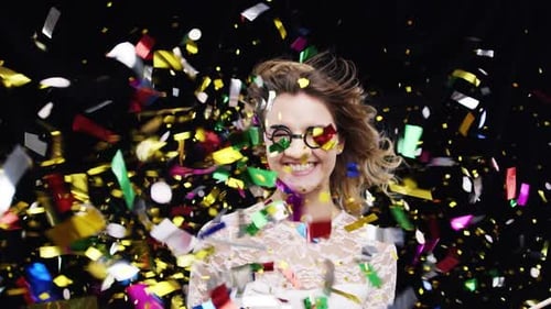 Woman Waving American Flag with Confetti Celebration