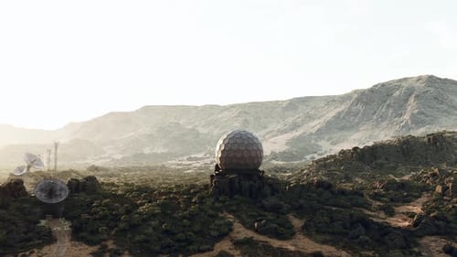 A Mountain with a Satellite Dish on Top