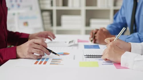 Close up of hands are working and brainstorming on paperwork about business financial and marketing.