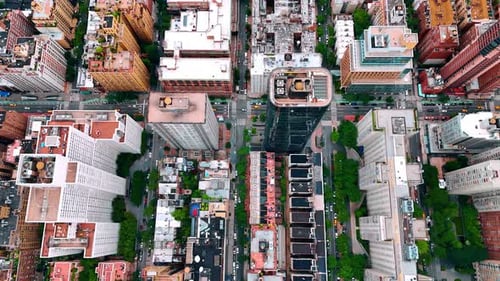Flight over the roofs of diverse buildings in the neighborhoods of New York, USA.