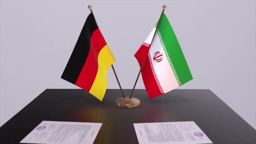 Flags of Germany and Iran on Table