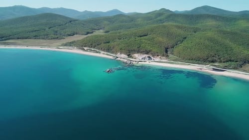 Aerial View of a Beach Turquoise Water and Huge Rocks in the Sea Beautiful Seascape
