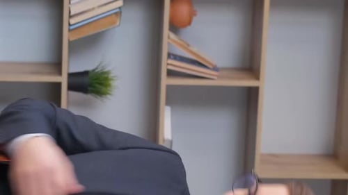 Angry Business Man in Glasses Talking on the Phone Office Manager at Work Vertical Video