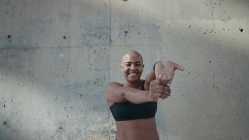 Woman Stretching Her Arms for Workout Routine