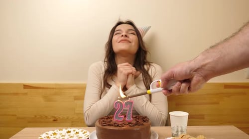 Woman Celebrates Birthday, Lights Candles, Makes Wish