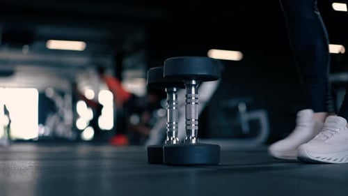 sports equipment in the gym heavy dumbbells active sports professional training close-up