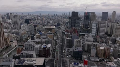 Aerial Panoramic View of Metropolis Multilane Main Road Leading Through Modern City High Rise