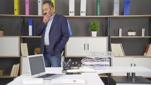 Thoughtful manager in his office.