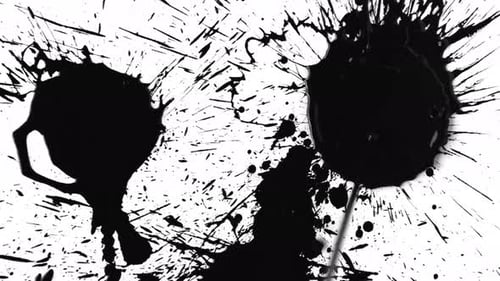 Hison Collection: A spray of ink in top right corner from below on an ink tainted surface shot in 4k