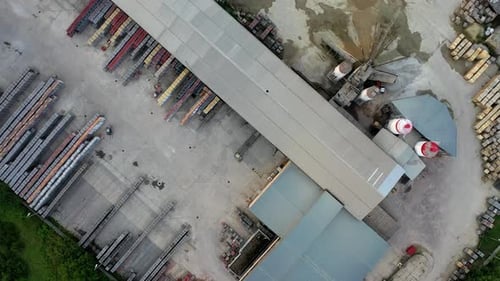 Brick factory with station of heavy machinery. Drone parallax