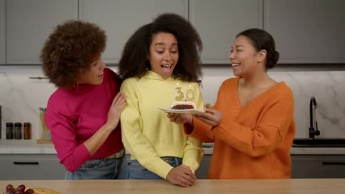 Excited Lovely African American Woman Receiving Birthday Cake with Candles