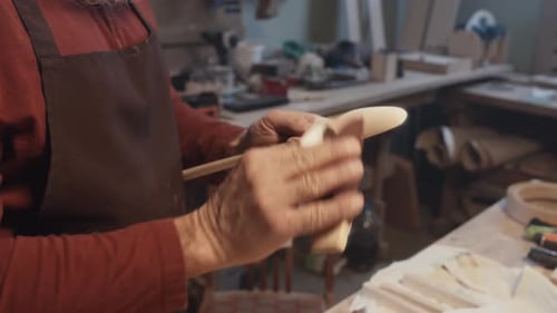 Smoothing Out New Cutlery with Sandpaper