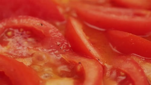 Cooking Fresh Peeled Sliced Tomato Juice Sauce in Pan Peeled Tomatoes Boiling in Their Own Juice