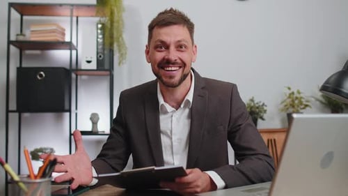 Business Man at Home Office Analysing Paperwork Documents Shocked By Sudden Victory Good News Wow