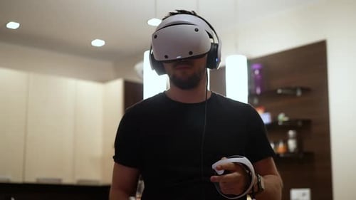 Man Wearing VR Headset Playing Video Game