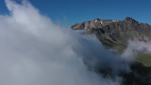 Aerial View of Clouds and Mountains at Sunrise