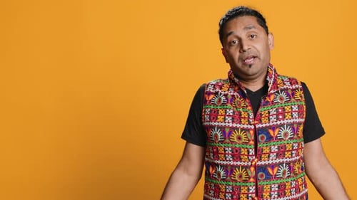 Man Shrugging Shoulders Unable to Provide Answer Studio Background